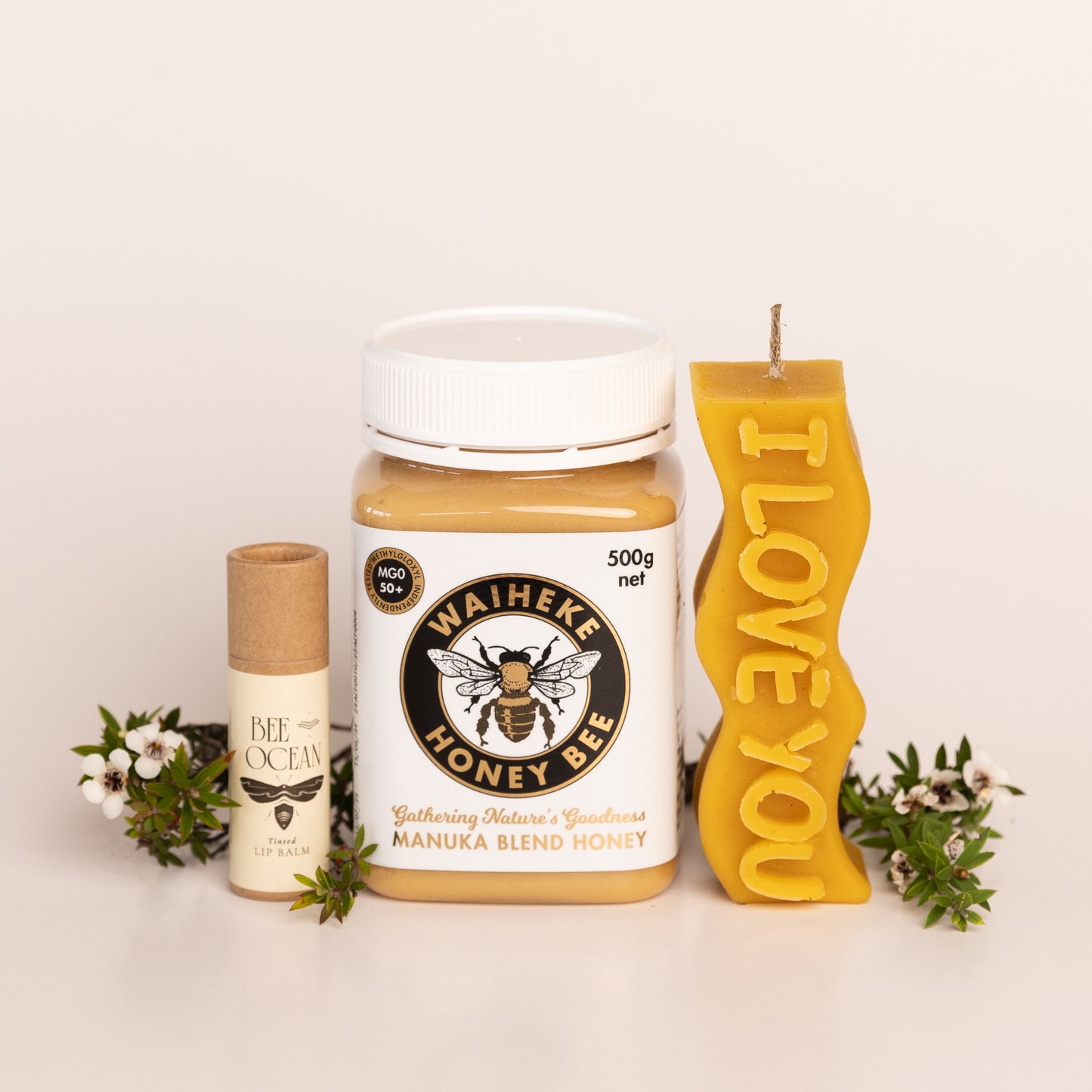 Manuka blend Honey , natural tinted lip balm and i love you beeswax candle Combo